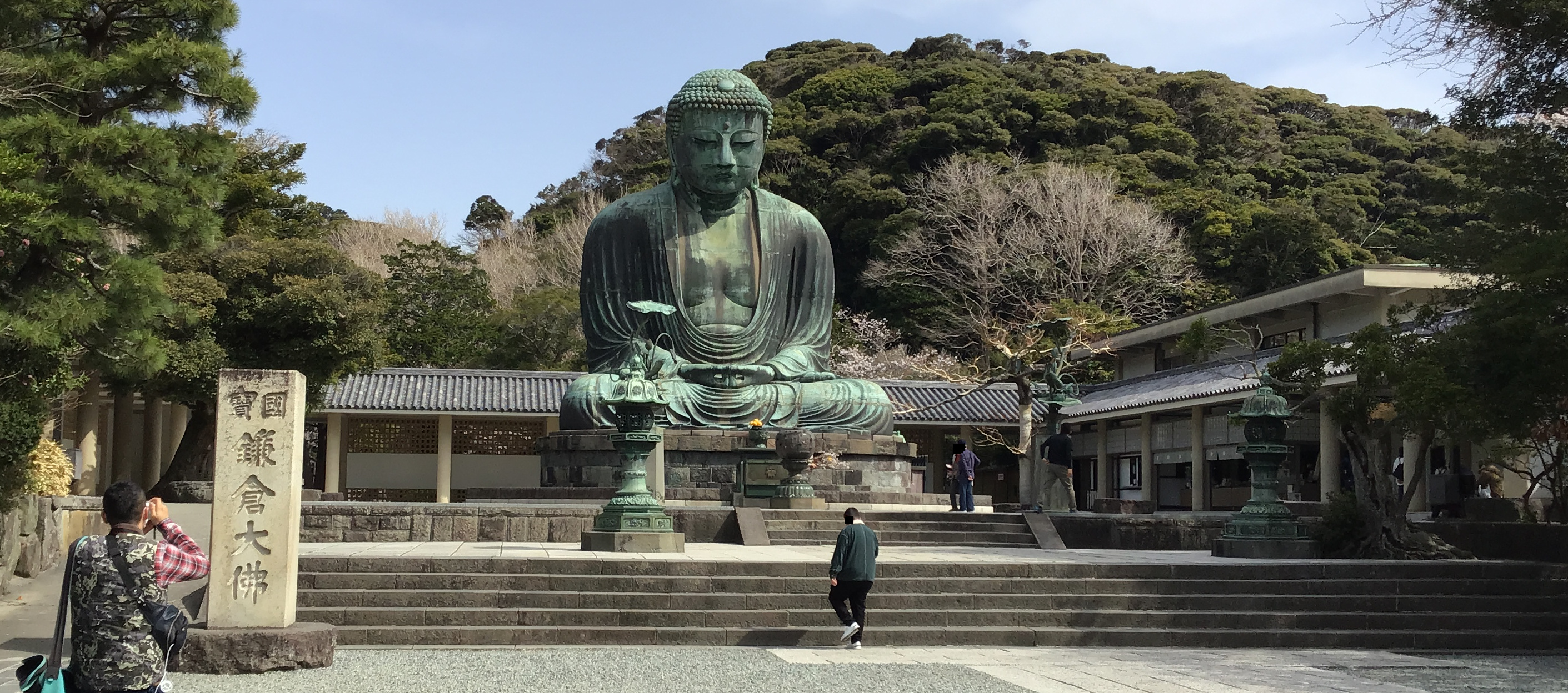 A giant buddha statue in the distance